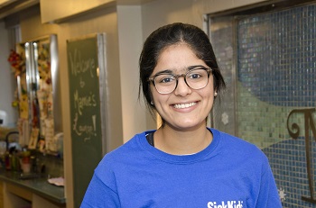 SickKids Volunteer Gurrattan smiling for a picture